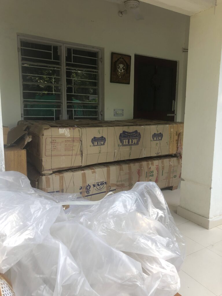 Army child moving homes with packed suitcases and trunks, symbolizing adaptability and constant change.